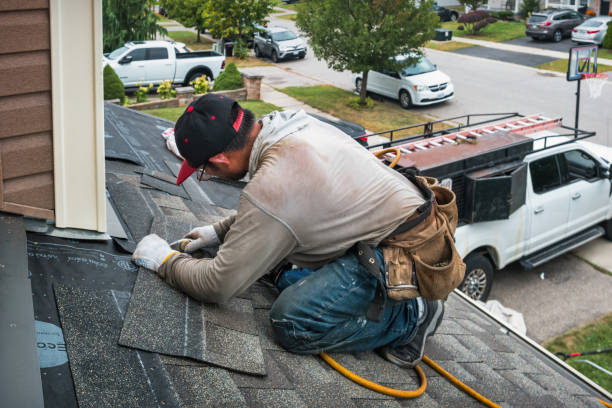 Professional Roofing technician working in Natrona Heights, PA
